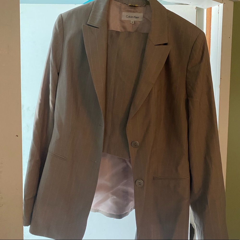 Woman’s blazer and skirt